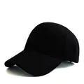 Detail view of a black five-panel baseball cap with curved brim and durable fabric - Adjustable / Black