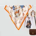 Classic silk scarf for women featuring floral and fashion motifs in ivory and orange - Ivory Orange