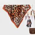 Classic leopard print silk scarf for women in brown and black hues, elegant accessory - Smudged Leopard