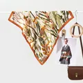 Elegant floral silk square scarf in warm orange and olive with premium rolled edges - 70x70cm / Tulip Caramel