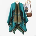 Chic thick cashmere-style knit poncho featuring a teal and bronze horse motif pattern - Lake Blue Stripe Horse