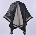 Detailed view of black and grey knit shawl with geometric patterns and fringe - Double Sided Sunflower Black Gray