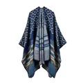 Close-up of thick knitted shawl featuring geometric jacquard patterns and colored stripes - Geometric Stripe Navy