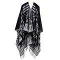 Ethnic knit shawl cloak with geometric patterns and tassel hem in black and gray tones - Cross Plum Black
