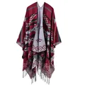 Detailed knit texture and black tassel fringe of red geometric cashmere poncho - Red Geometric