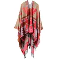 Close-up of bohemian geometric knit shawl with red ethnic patterns and black fringe trim - Indian Bright Red