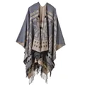 Detail view of ethnic style fringe and geometric patterns on a thick split shawl - Cross Plum Gray