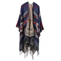Close-up of navy blue tribal geometric patterns and black tassels on heavy knit poncho - Navy Blue Geometric