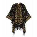 Detail of geometric knit poncho featuring ethnic patterns and black fringe tassels - Tassel Large Wave Black Yellow / Brown