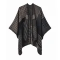 Detail of geometric pattern knit poncho with black and khaki checkerboard texture - Gray Coffee Geometric Stripe