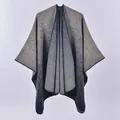 Knit oversized poncho featuring a blue gradient design and hand-stitched hem edges - Gradient Navy