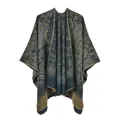 Detail of vintage paisley pattern on thick knitted winter poncho with fine edge stitching - Lake Blue Paisley