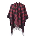 Detail of red and black buffalo plaid poncho featuring long tassel fringe edges - Red Plaid