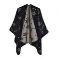 Detail of soft jacquard knitted fabric showing starry sky patterns and stitching finish - One Size / Stars Black