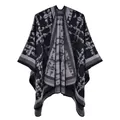 Detail shot of the thick knit texture and geometric color blocking on the women shawl - Grid Camouflage Black