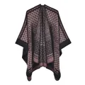 Detail of geometric diamond pattern knit poncho with black trim and vintage style - Black Wine Red
