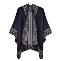 Close-up of knit fabric texture and floral jacquard pattern on the black shawl - Black