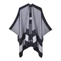 Detail of grey striped knit poncho showing the high-quality woven texture and hem finish - 130x150cm / Black And White