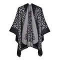 Close-up of leopard print knit shawl in grey and black featuring open front design - Black Leopard
