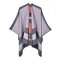 Detailed close-up of striped knit poncho featuring soft pink, grey and orange patterns - 130x150cm / Gray And Pink