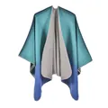 Detailed close-up of blue-green gradient knit shawl showing edge stitching and fabric texture - Blue Gradient