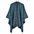 Detailed view of paisley patterns and lockstitching on knit teal and brown shawl - Flame Auspicious Cloud Lake Blue