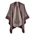 Close-up of leopard print shawl showing thick cashmere-like texture and edge stitching - Coffee Leopard