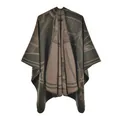 Detail of warm knit poncho shawl with thick cashmere-like texture and abstract patterns - 130x150cm / Green Carriage