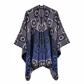 Close-up of knit shawl texture with navy geometric jacquard pattern and split design - Navy Blue