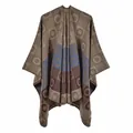 Close-up of jacquard knit shawl showing colorful geometric patterns and fine edge stitching - Khaki