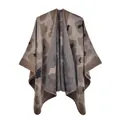 Detailed view of leopard print knit texture and hem stitching on cashmere-like shawl - Large Leopard Khaki