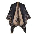 Detail of vintage floral knit poncho showing double-sided fabric and scalloped edges - 130x150cm / Morning Glory Black Coffee