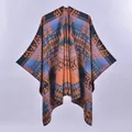 Bohemian knit shawl with orange and blue geometric patterns in a front-view display - Reversible Rhombus Blue Orange