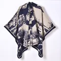 Women's knit poncho wrap with blue and cream jacquard pattern for outdoor warmth - Galloping Horse Navy