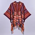 Ethnic hooded poncho with colorful plaid patterns and fringe trim for a boho winter look - Hooded Tassel Plaid Poncho / Orange Wine Red