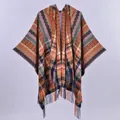 Detailed view of colorful geometric knit pattern and soft fringe on the hooded poncho - Hooded Tassel Plaid Poncho / Yellow