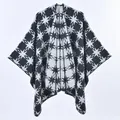 Close-up of black and white geometric pattern on soft cashmere-like knit cape - 135cmx155cm / Black & White