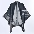 Detailed view of the black and gray jacquard knit texture on a luxury shawl cape - Undersea Starry Sky Black