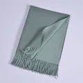 Soft faux cashmere winter scarf in dusty blue with elegant fringe tassel details - Green