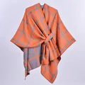 Detail of orange and grey checkered knit shawl with double-sided jacquard texture - Gray Orange Plaid