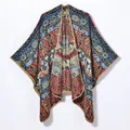 Bohemian geometric knit poncho with ethnic red and blue patterns and gold trim - Lake Blue Rhombic Stripe