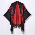 Women's knit poncho wrap with red geometric patterns and long black fringe tassels - Red Black Geometric