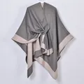 Detail of grey and beige color block shawl showing soft knit texture and edge stitching - Grey Pink Patchwork