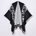 Elegant black and white geometric knit shawl with tassel hem for a stylish outer layer - White Black Geometric