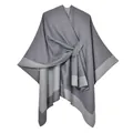 Detail of grey cashmere-like split poncho showing soft knit texture and ring buckle closure - Grey Patchwork