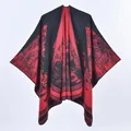 Thick knit poncho for women featuring red and black tropical palm leaf jacquard patterns - 135x155cm / Jungle Black Red