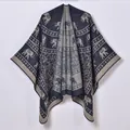 Ethnic knit poncho featuring navy blue elephant patterns and bohemian geometric textures - 130x150 / Navy Blue