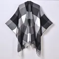 Classic black and white plaid knit shawl wrap with fringe tassel hem for winter travel - Black Wavy Plaid