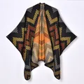 Women's thick knit poncho with geometric diamond pattern in black and orange colors - Black and Yellow