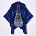 Women's plaid poncho shawl with blue tartan check pattern in a warm knit cape design - Blue and Black Plaid